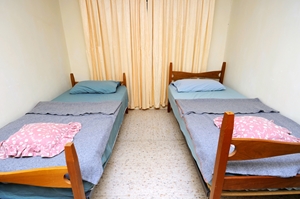 Room at hostel with two beds