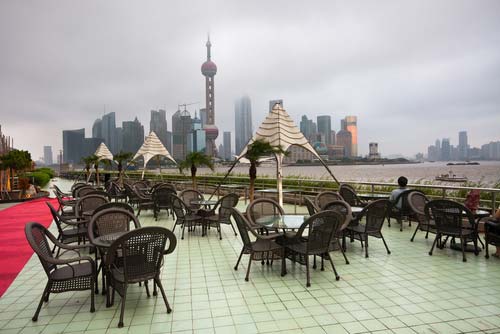 Rooftop restaurant bar in Shanghi overlooking the city skyline